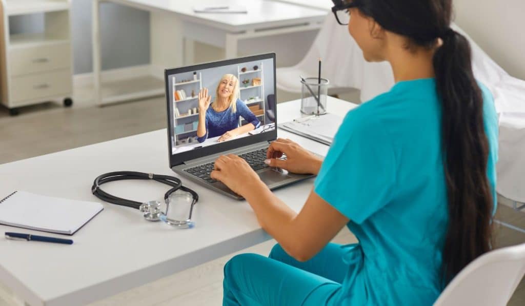 woman having online therapy session