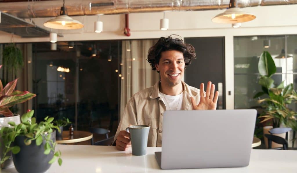 man having therapy online appointment