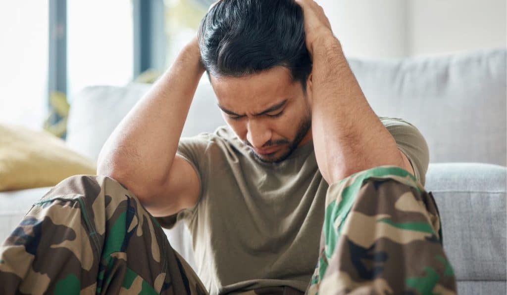 young man struggling with past events