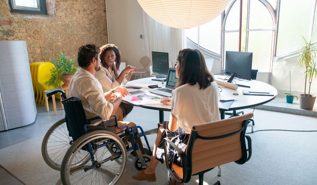 people with disability at the table talking