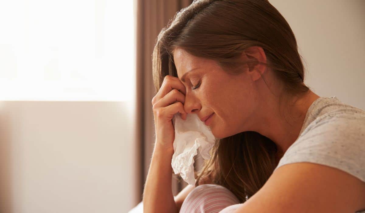 woman inside room depressed