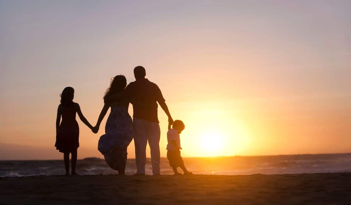 family outside at the beach