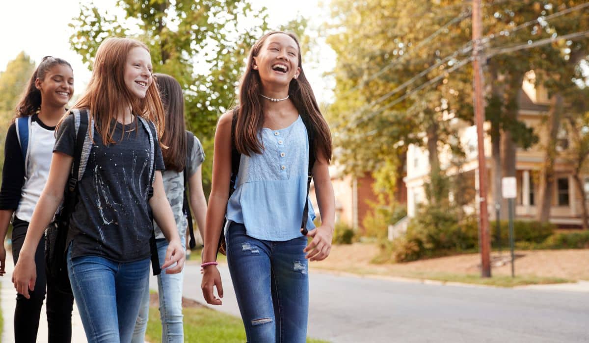 teenagers walking and talking